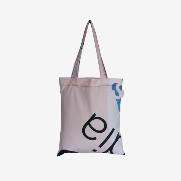 04 Dos de tote bag en toile publicitaire blanche et rose.