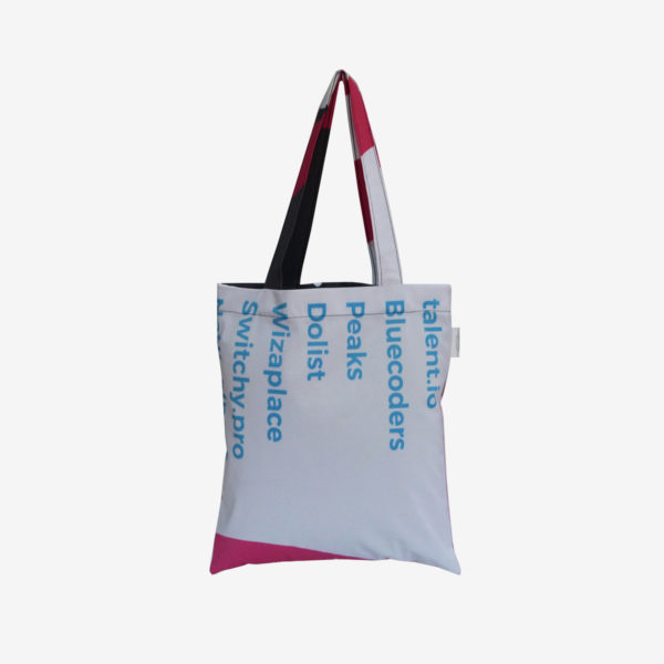 06 Dos de tote bag en toile publicitaire multicolore.