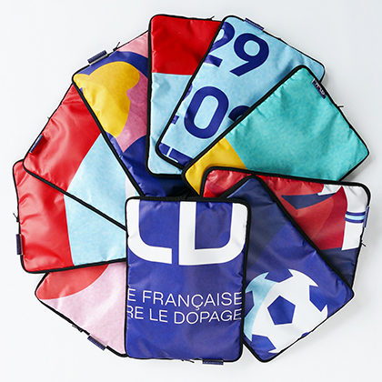 Upcycling en housses 14 pouces des bâches publicitaires de AFLD Ile de France