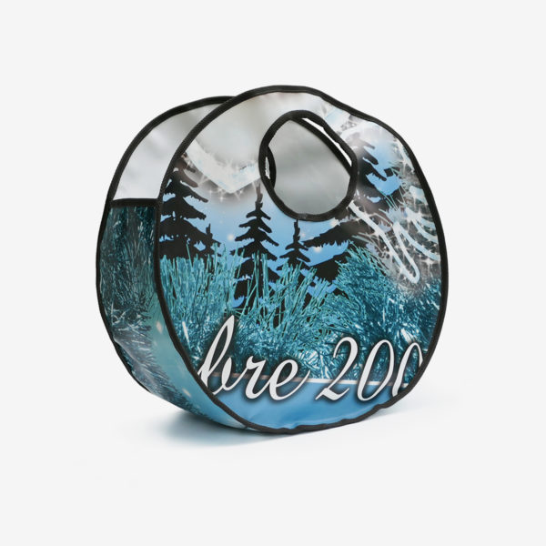 Sac rond image noël. Upcycling des bâches publicitaire en cabas rond. Economie circulaire et fabrication Française.